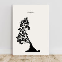 Black silhouette of a tree with leaves on a white background, featuring the word 'Growing'.