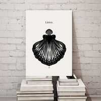Canvas print with a black shell design and 'Listen.' text on a white background, leaning against a white brick wall.