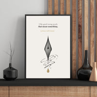 Framed artwork with a quote and inkwell design on a wall with decorative vases.