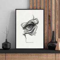 Framed artwork of a stylized eye on a wall with decorative vases.