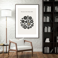 Framed artwork with gears on a wall in a modern living room.