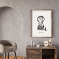 Framed artwork on a wall above a wooden console table with decorative items.