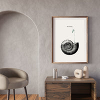 Framed artwork on a wall above a wooden console table with decorative items.