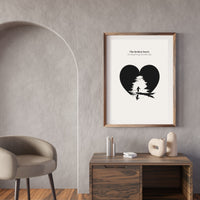 Framed artwork with a heart design on a wall in a modern room.