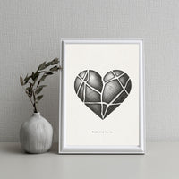 Framed artwork of a geometric heart design on a neutral background with a vase and leaves.