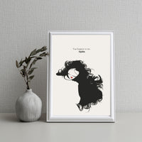 Framed artwork of a stylized woman with flowing hair on a neutral background