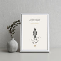 Framed artwork with a quote and ink pen design on a textured wall background
