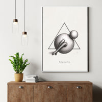 Framed abstract art print on a wall above a wooden cabinet with a plant and books.