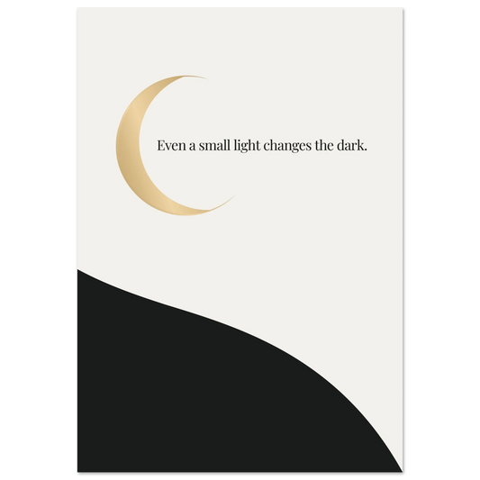 Minimalist poster with a golden crescent moon over a cream and black divided landscape — Even a small light changes the dark quote by Monoquote